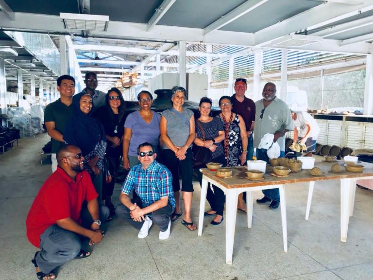 Group of people making pots