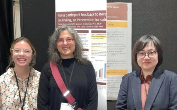 Pictured L to R: MSW Graduate Student Sonia Harris, Associate Professor Amy Krentzman, Assistant Professor YuanYuan Hu in front of their conference presentation posters.