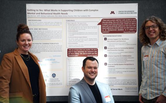 Three Minn-Link researchers stand in front of a poster outlining their research findings. From left to right: Kristine Piescher, PhD, Michael Hoffmeister, PhD, Quinn Oteman, MSW, present CASCW’s latest Getting to Yes research findings at the CEHD Research & Innovation Day on March 20, 2025.